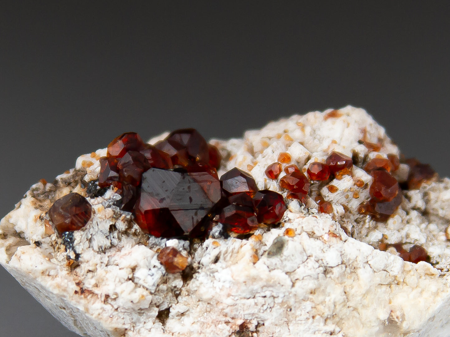 Spessartine Garnets on Microcline