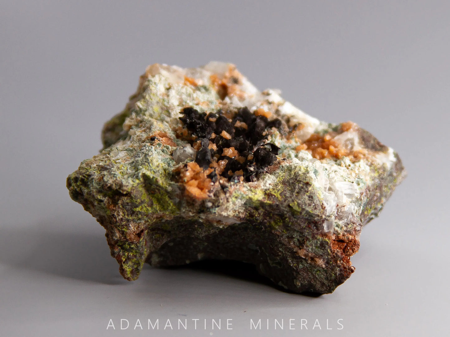 Microcline Var. Adularia, Epidote, and Tenorite-Coated Copper