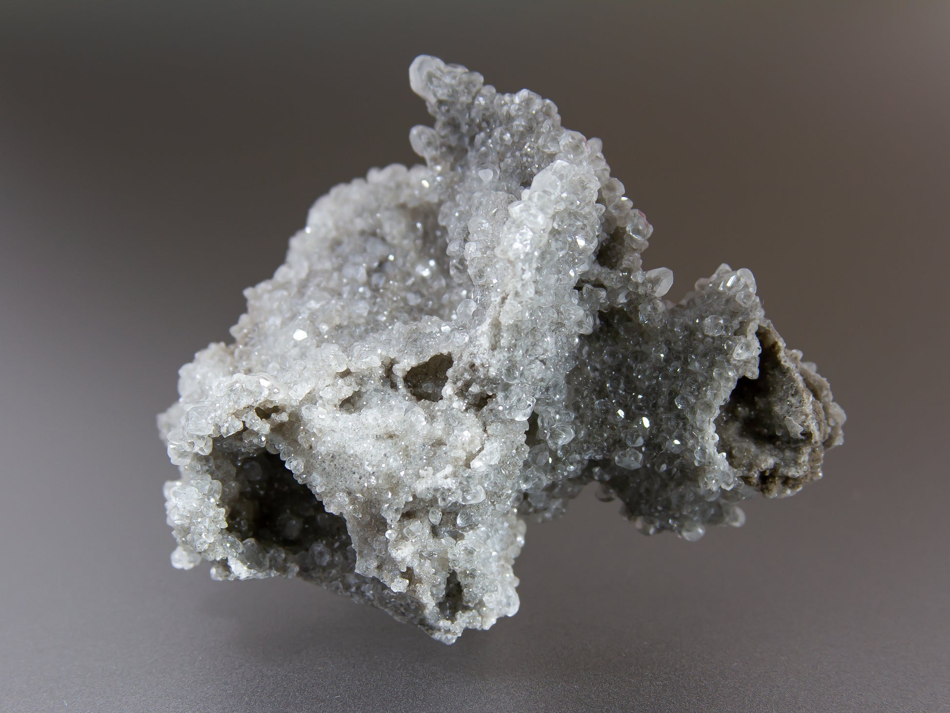 Mineral sample on a gray background