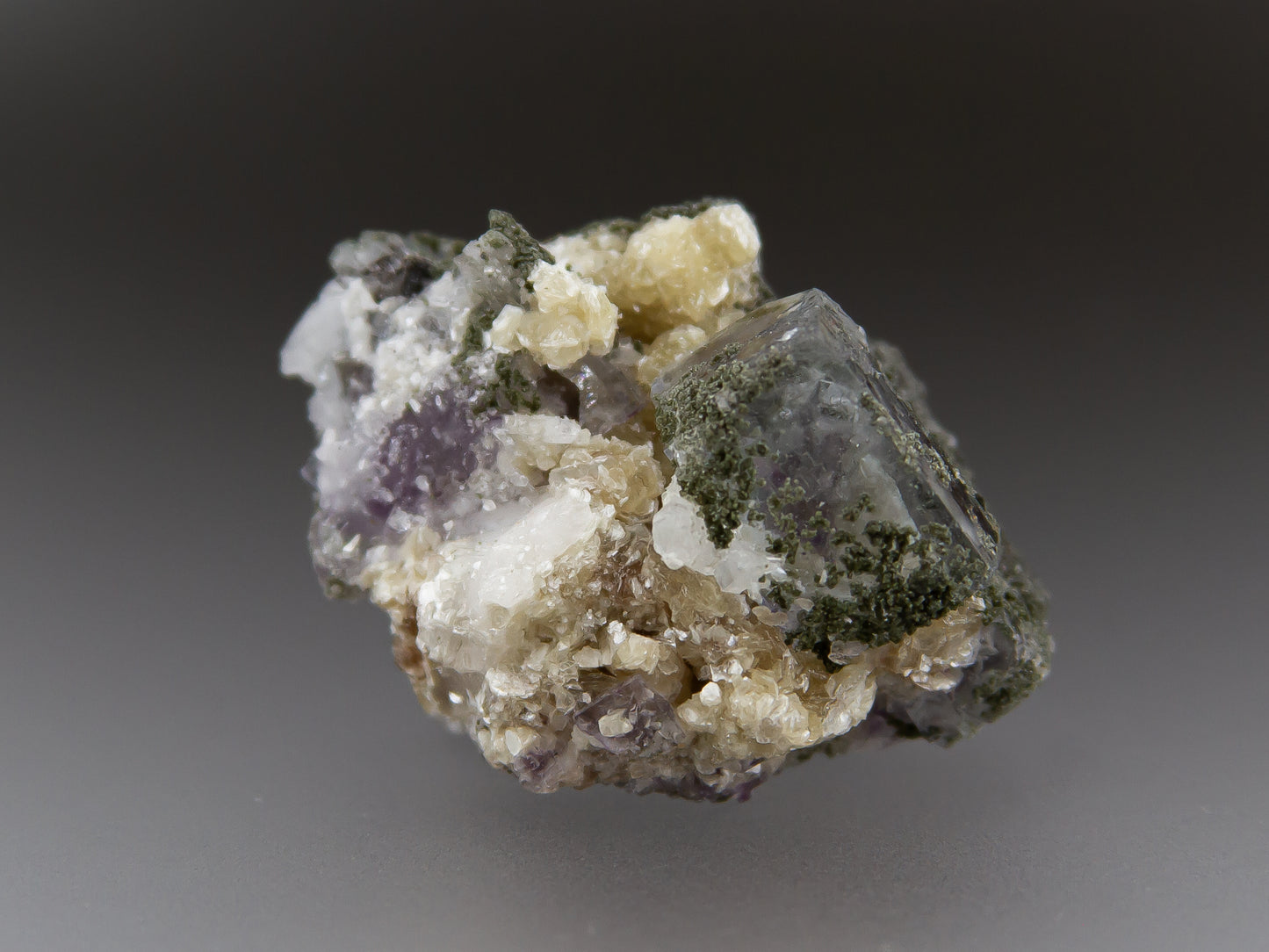 Fluorite, Muscovite, Quartz, and Chlorite