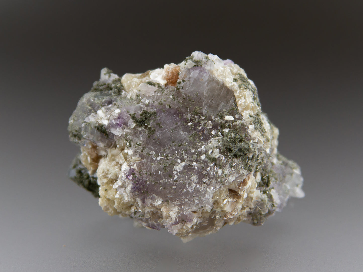 Fluorite, Muscovite, Quartz, and Chlorite