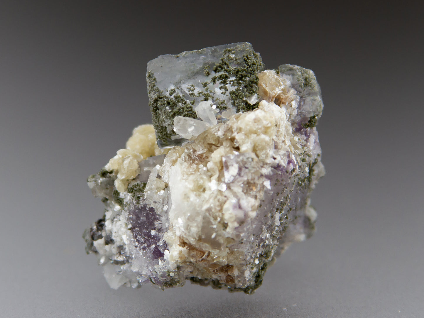 Fluorite, Muscovite, Quartz, and Chlorite