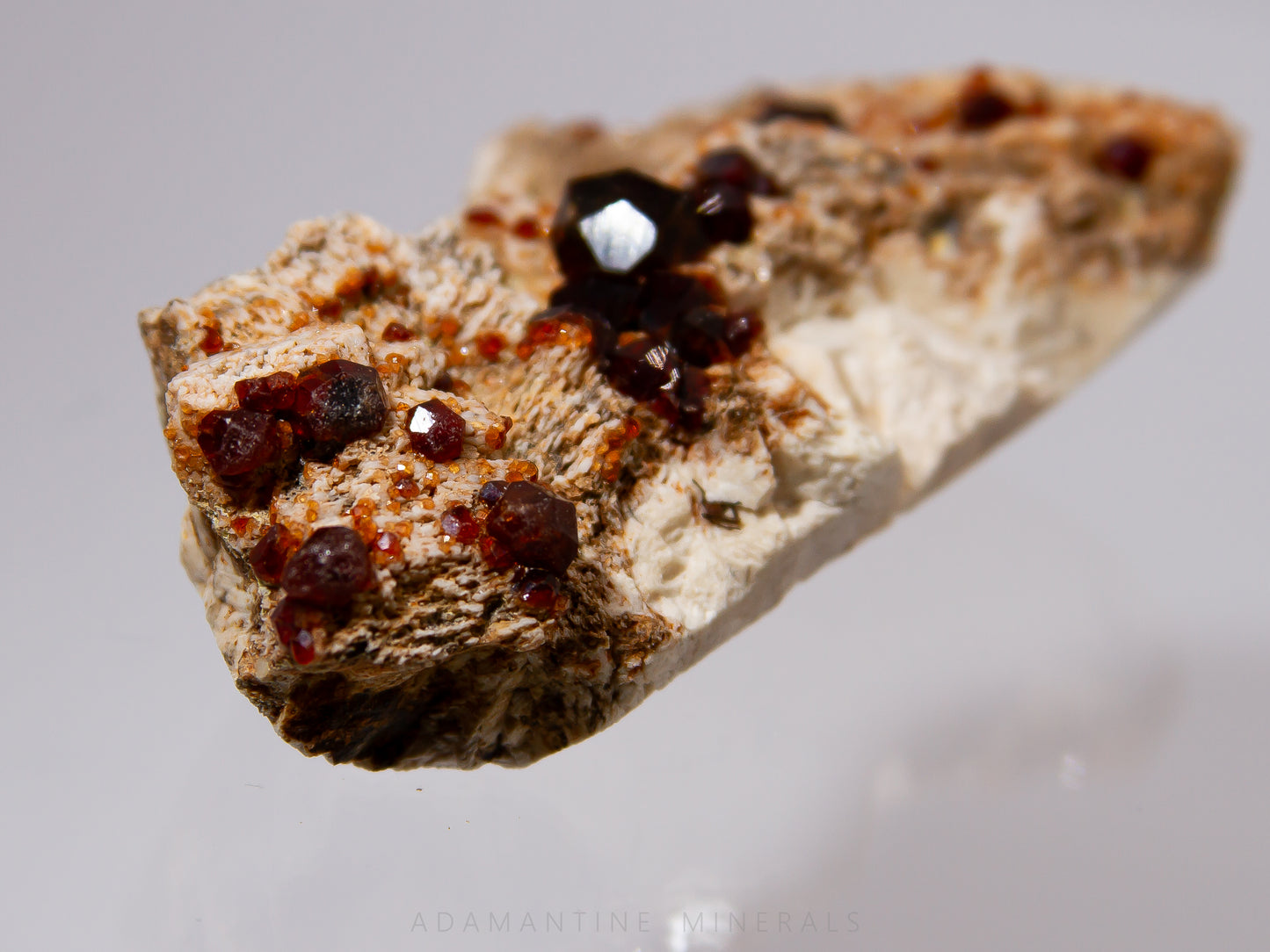 Spessartine Garnet on Microcline