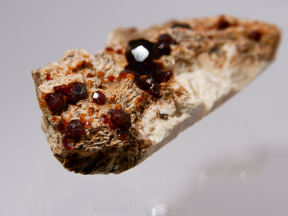 Spessartine Garnet on Microcline