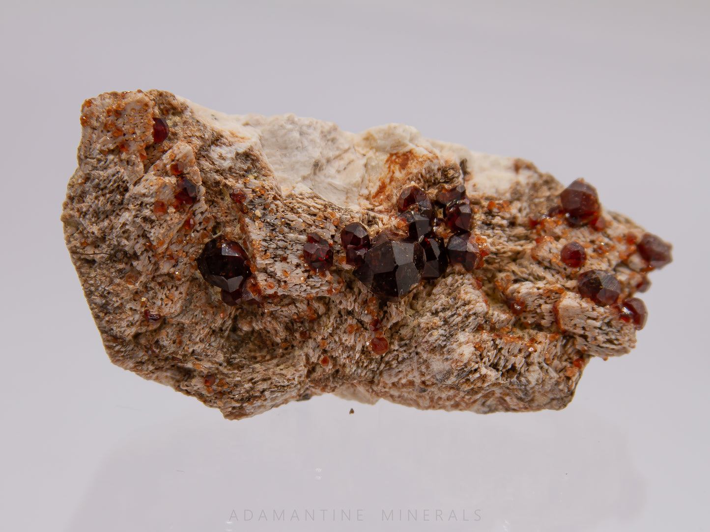 Spessartine Garnet on Microcline