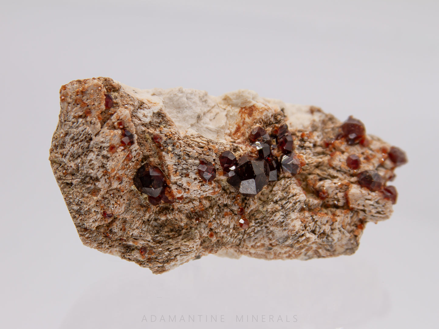 Spessartine Garnet on Microcline