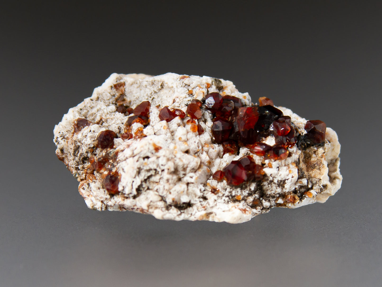 Spessartine Garnets on Microcline