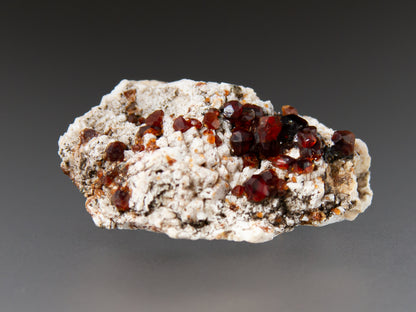 Spessartine Garnets on Microcline