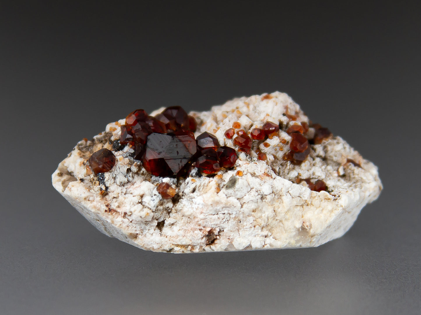 Spessartine Garnets on Microcline