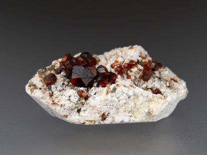 Spessartine Garnets on Microcline