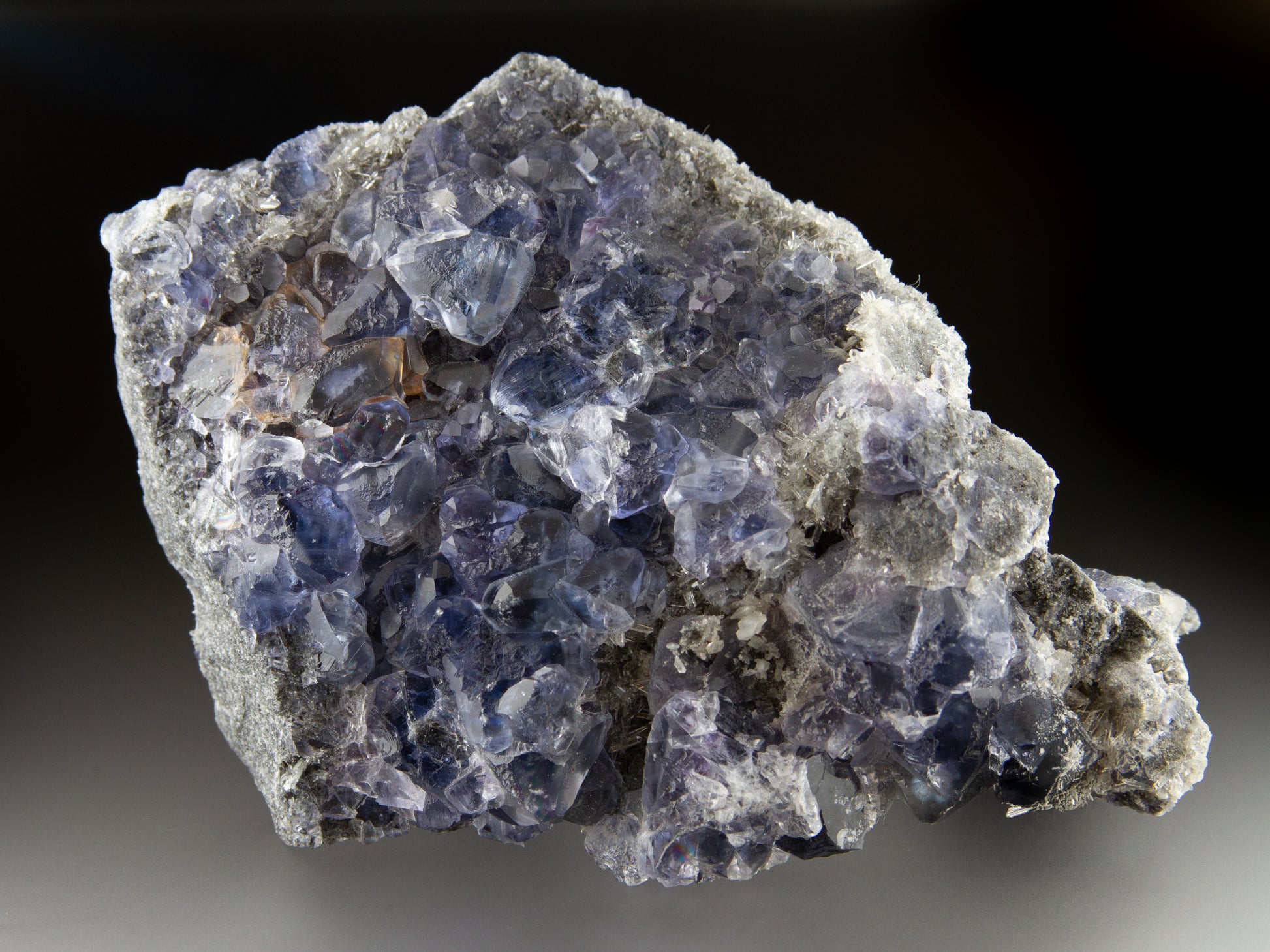 Blue fluorite crystals on matrix with octahedral crystal formation