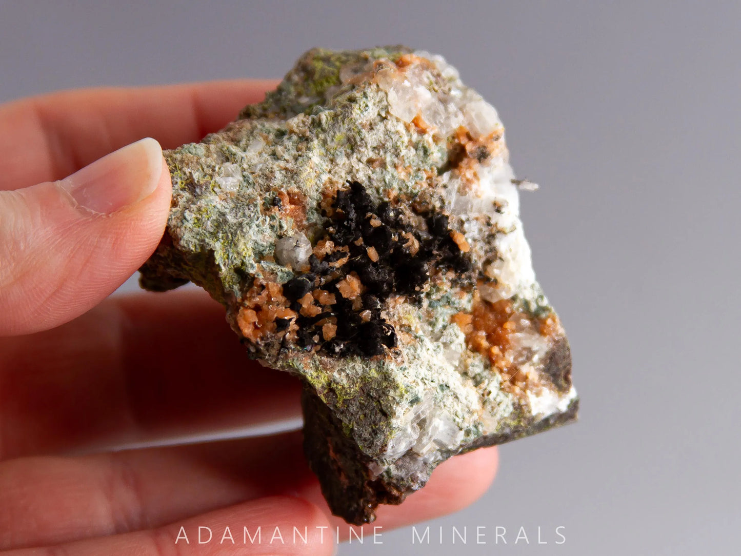 Microcline Var. Adularia, Epidote, and Tenorite-Coated Copper