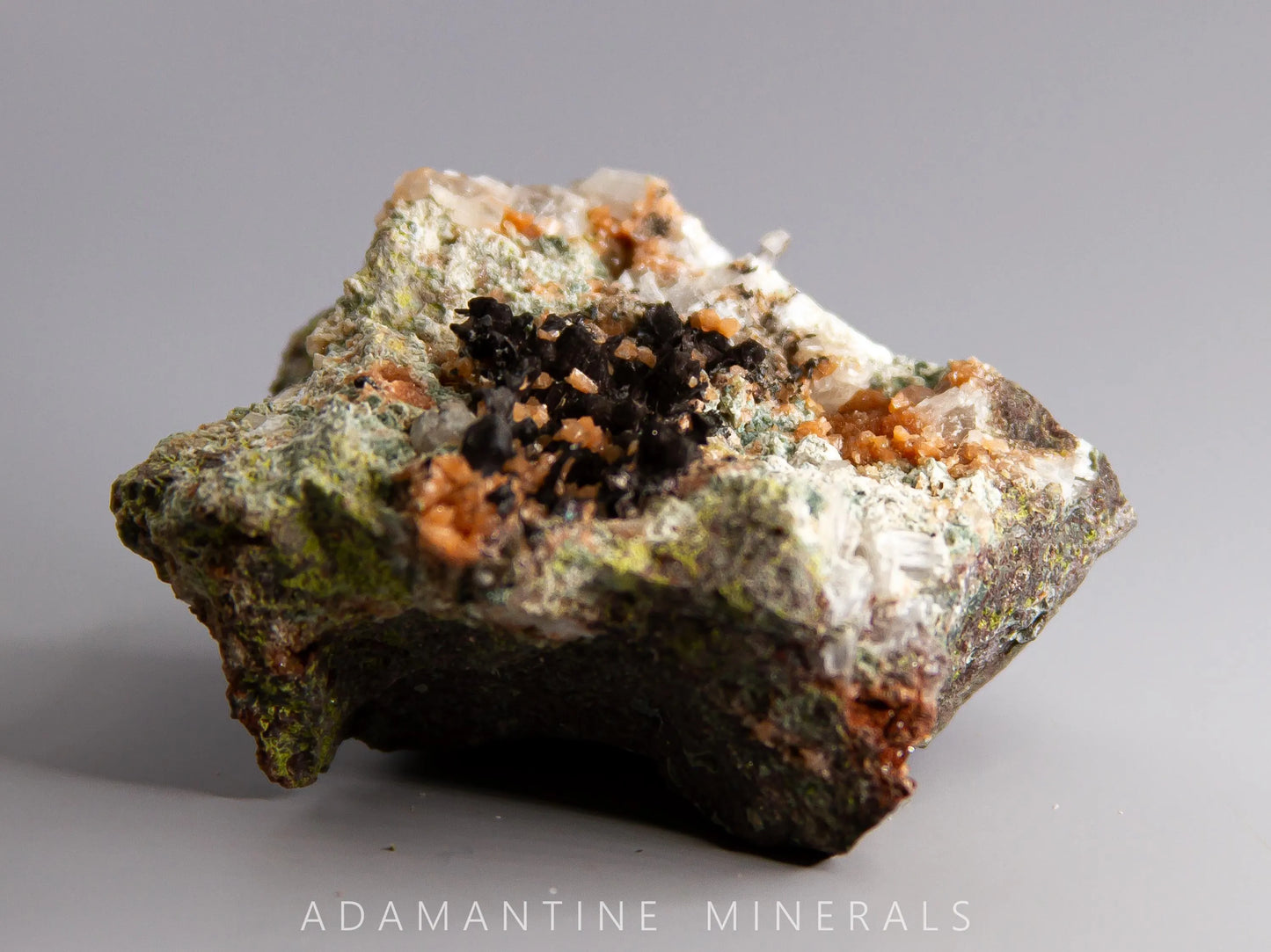 Microcline Var. Adularia, Epidote, and Tenorite-Coated Copper