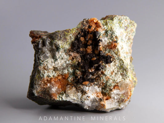 Microcline Var. Adularia, Epidote, and Tenorite-Coated Copper