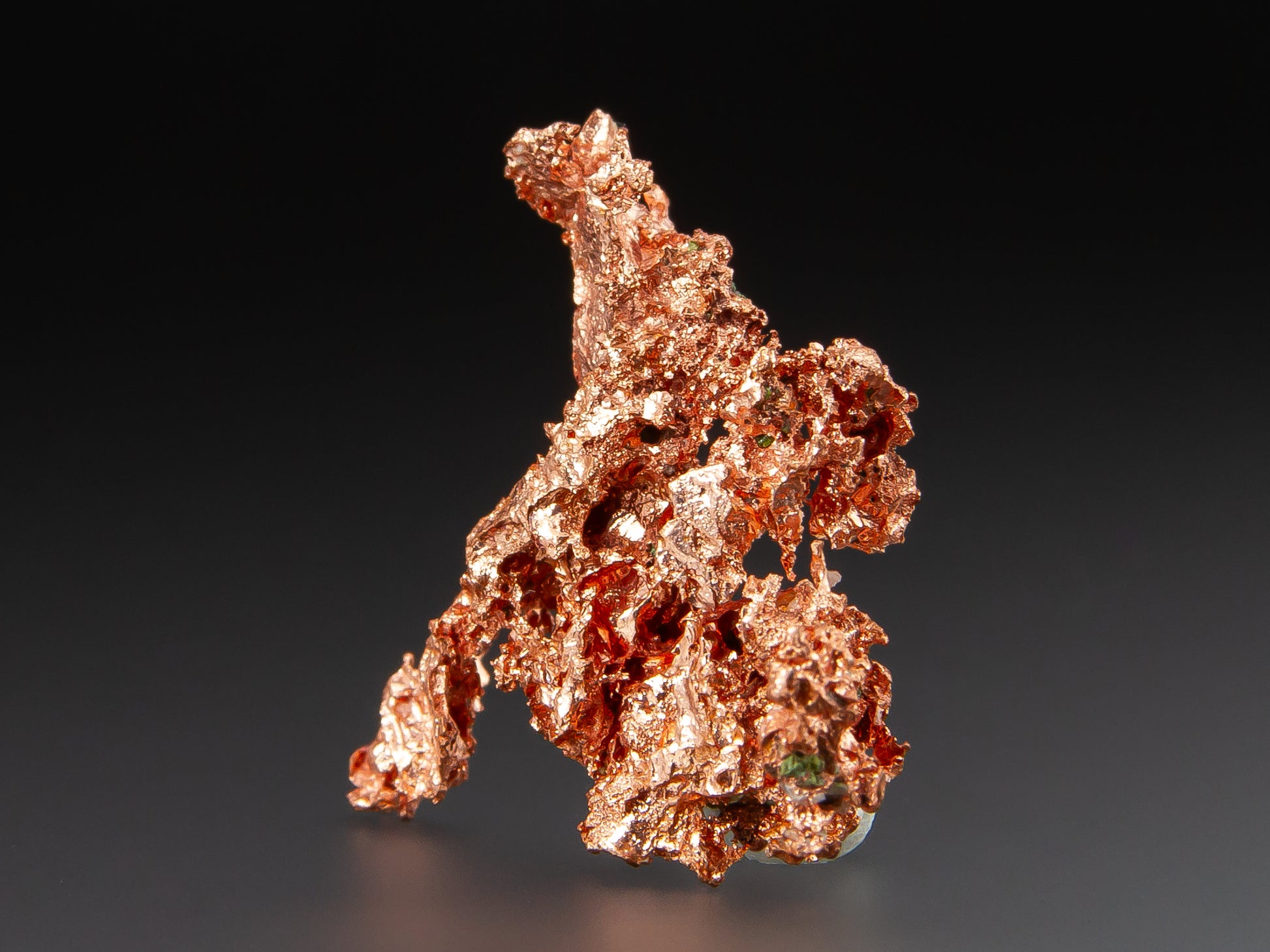 Copper mineral specimen on a dark background