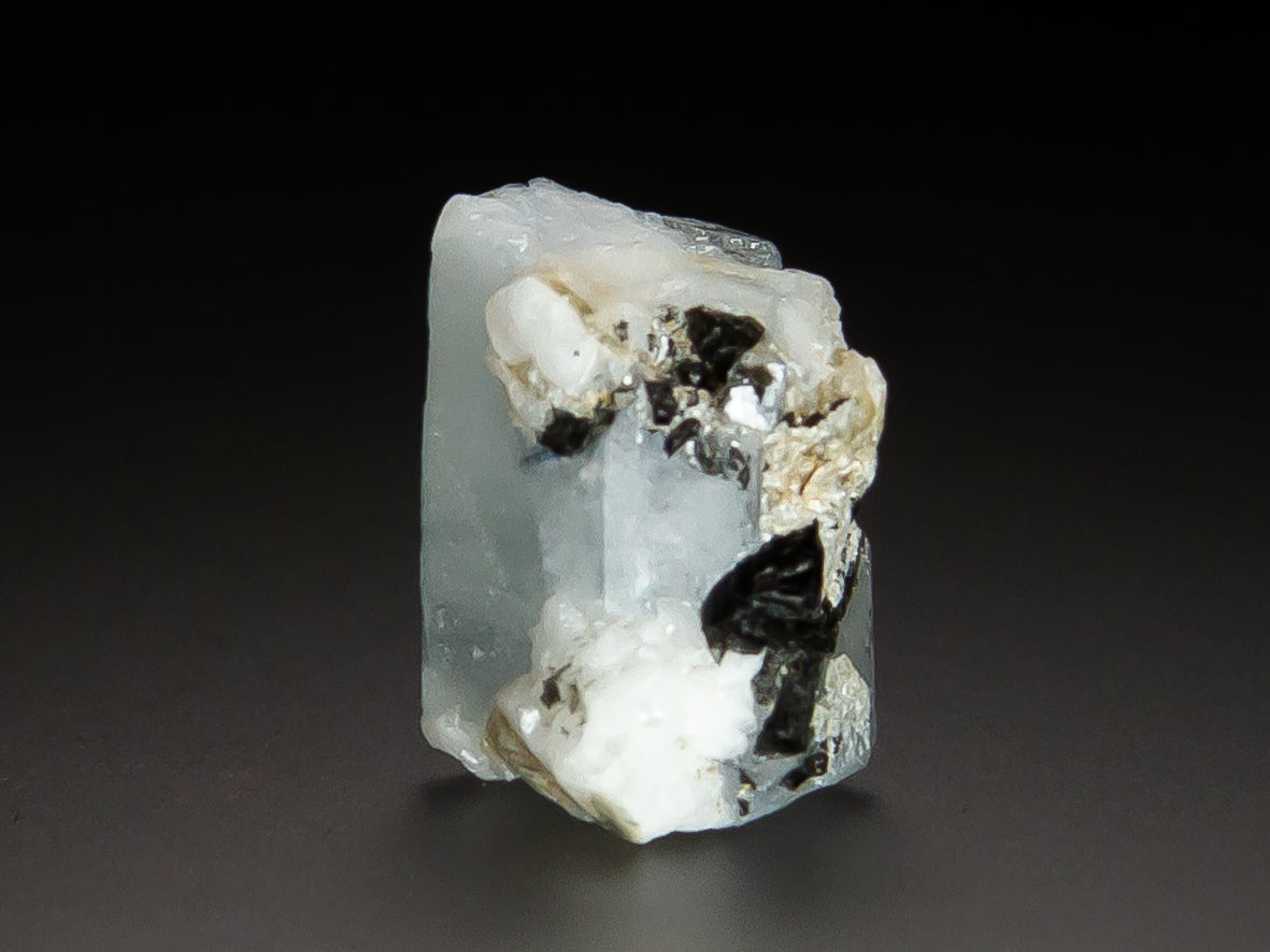 Beryl Var. Aquamarine with Inclusions of Tourmaline