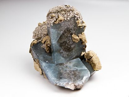 A cluster of two blue celestine crystals with fine calcites.